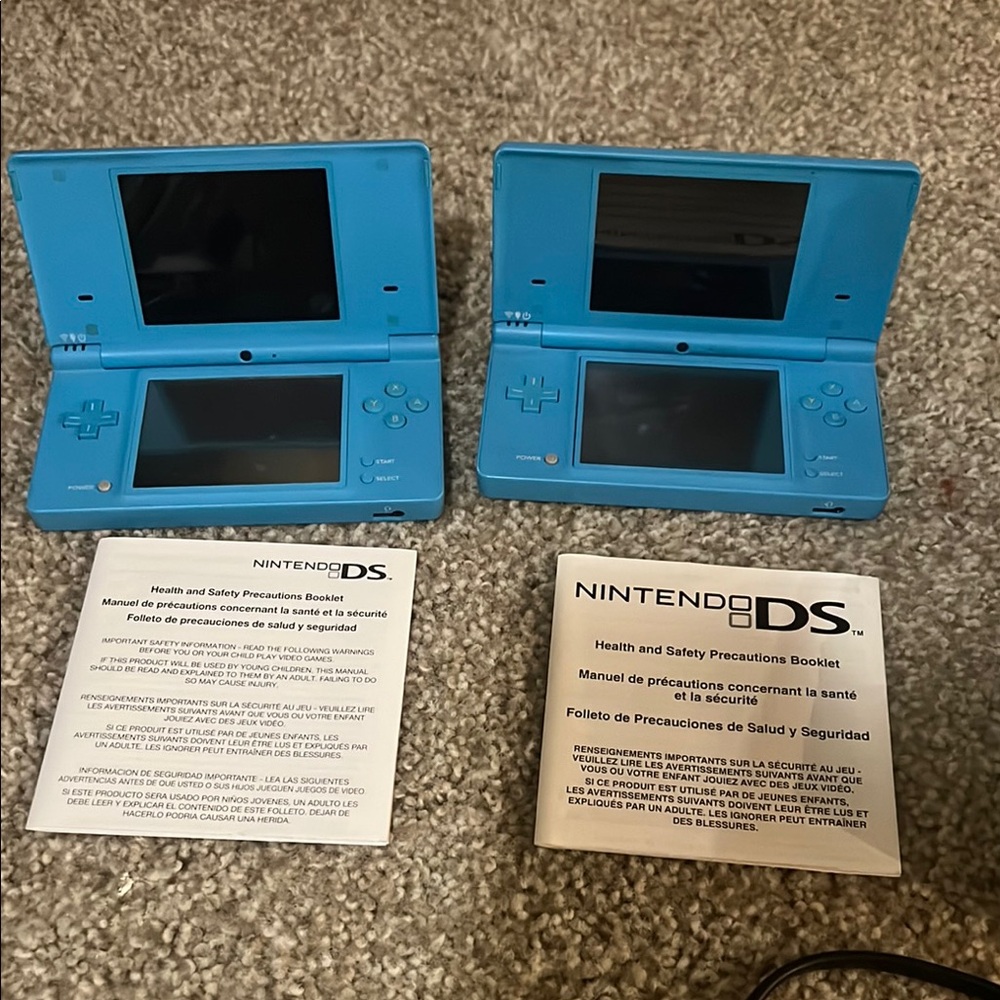 Two Nintendo DS  with 18 games, case, car/wall charger , 2 stylus pens